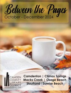 On the Cover of the CCLD Quarterly Magazine Between the Pages is a cup of coffee or hot cocoa in a white cup sitting on a plaid blanket next to an open book with leaves.